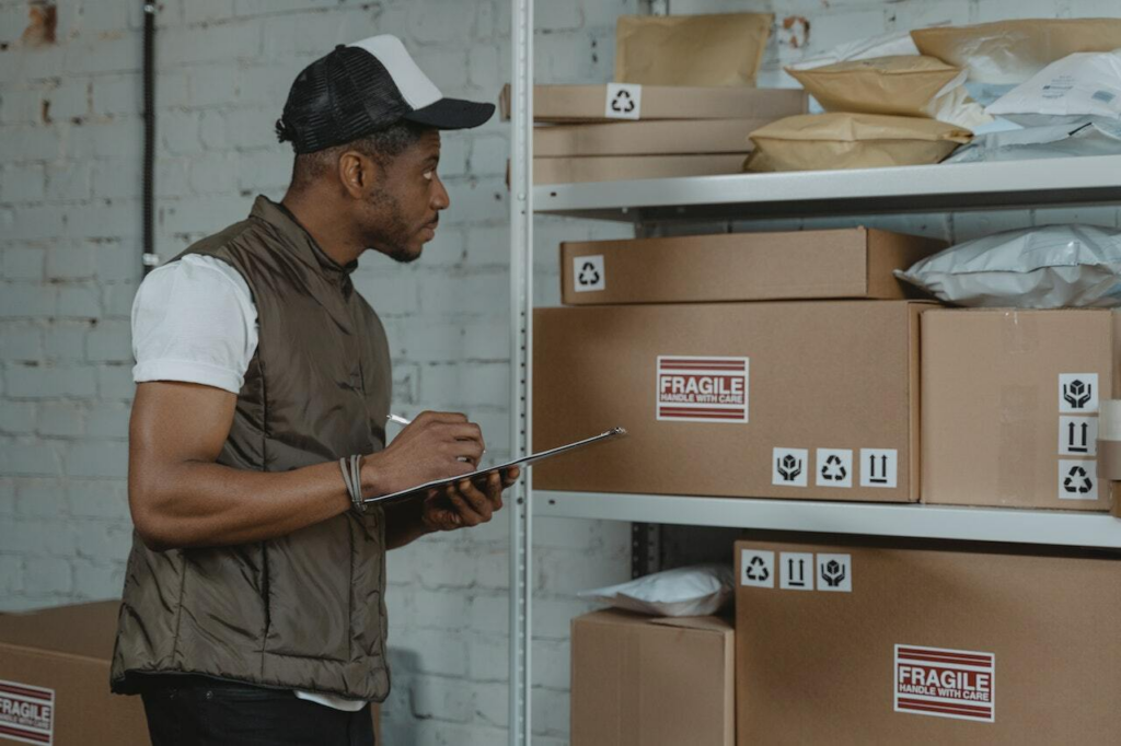 Warehouse staff inspecting incoming parcels before international shipping