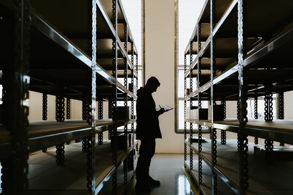 Warehouse staff checking incoming Chinese orders before shipping