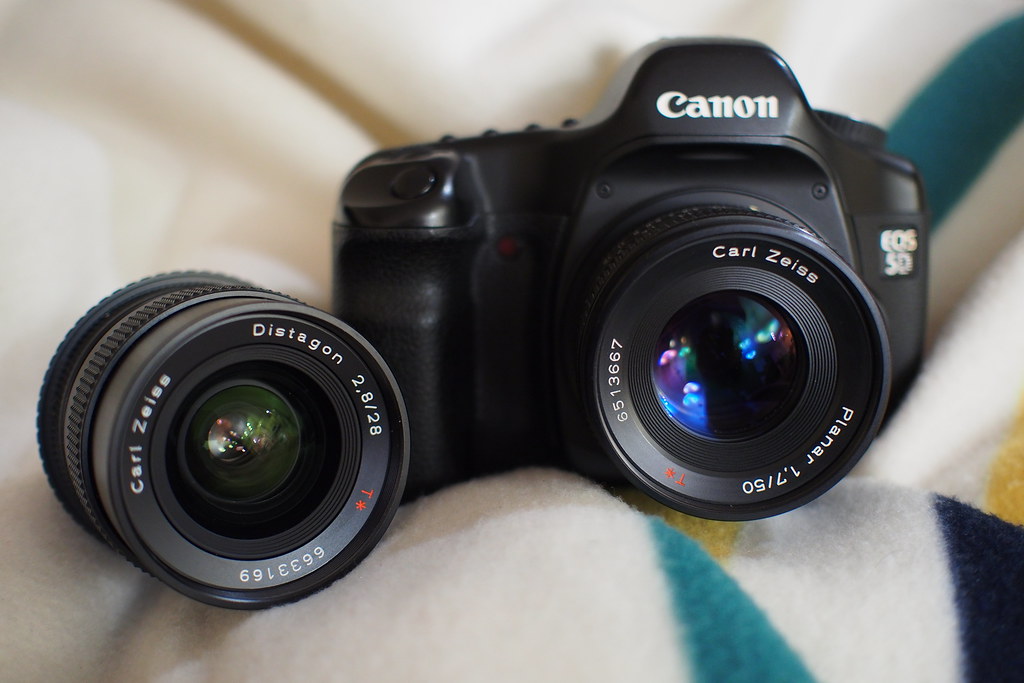 Used camera lenses compared before purchase approval
