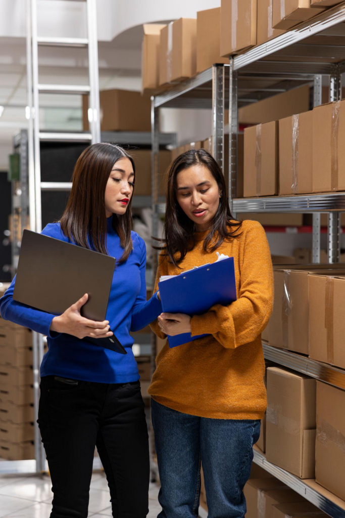 Warehouse staff inspecting parcels for overseas Taobao orders before shipping