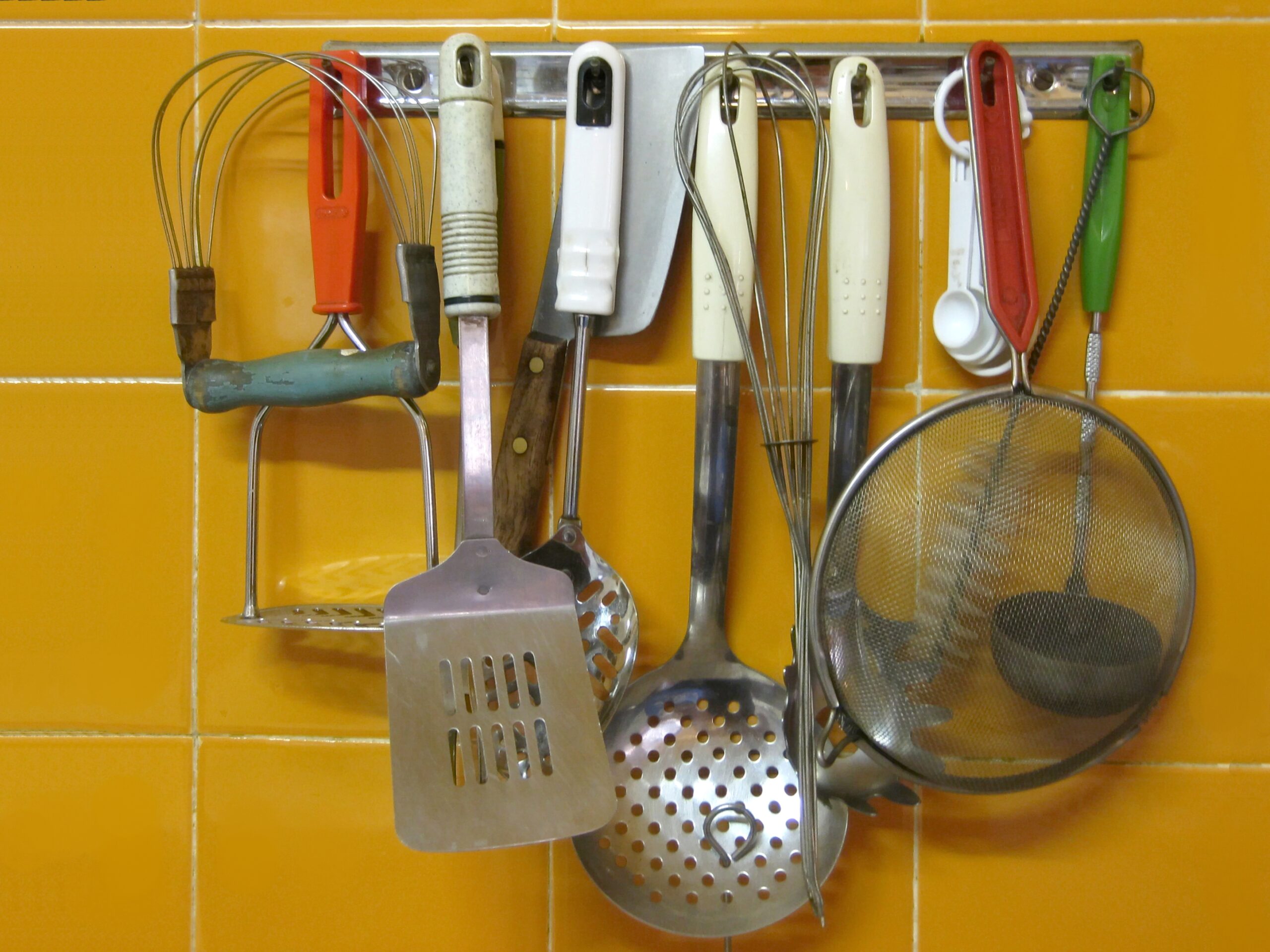 Assorted kitchen utensils arranged together for product review
