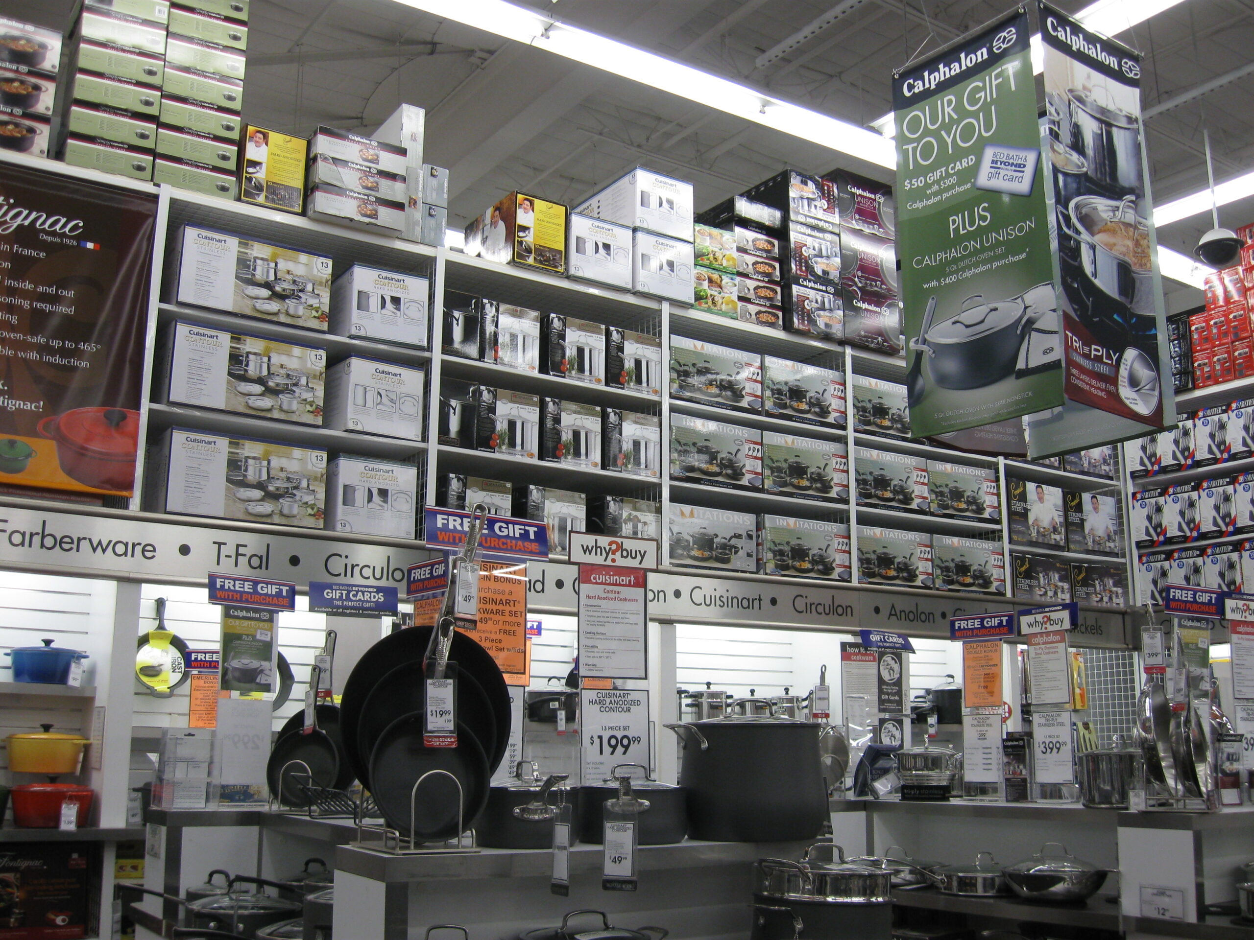 Cookware and kitchen items displayed in a retail store section