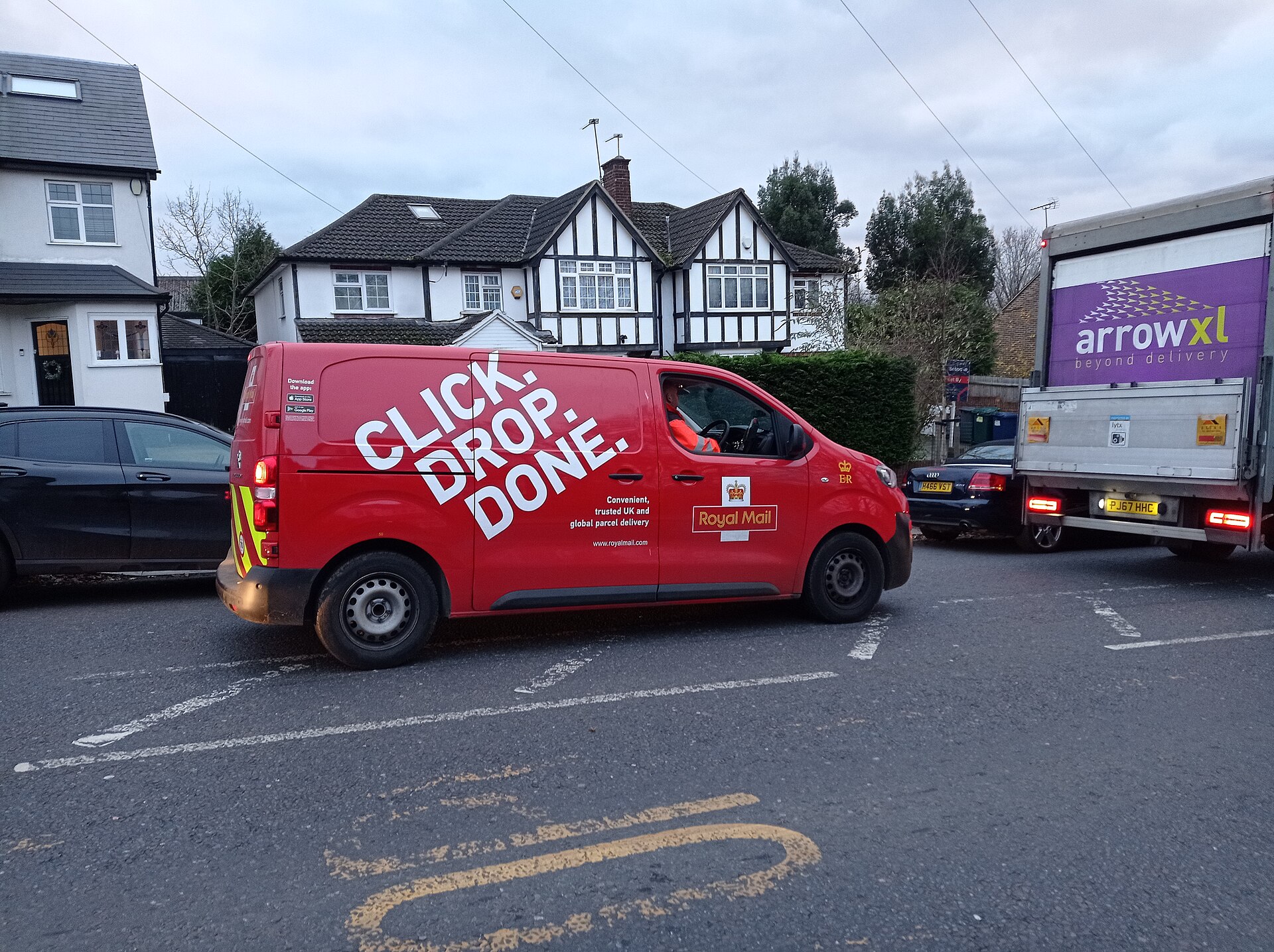 Royal Mail van prepared for parcel collection and delivery