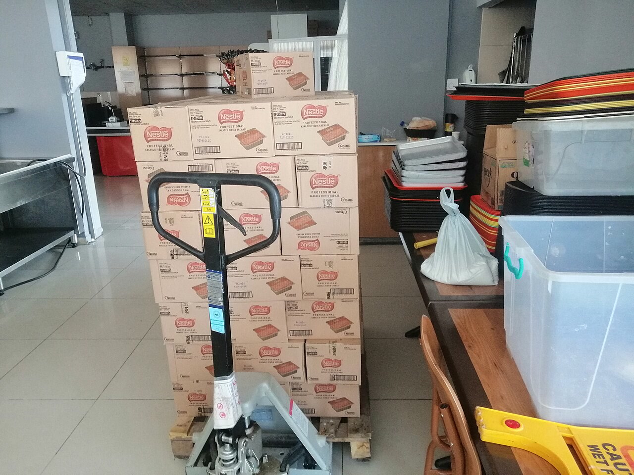 Palletized cartons staged for warehouse handling