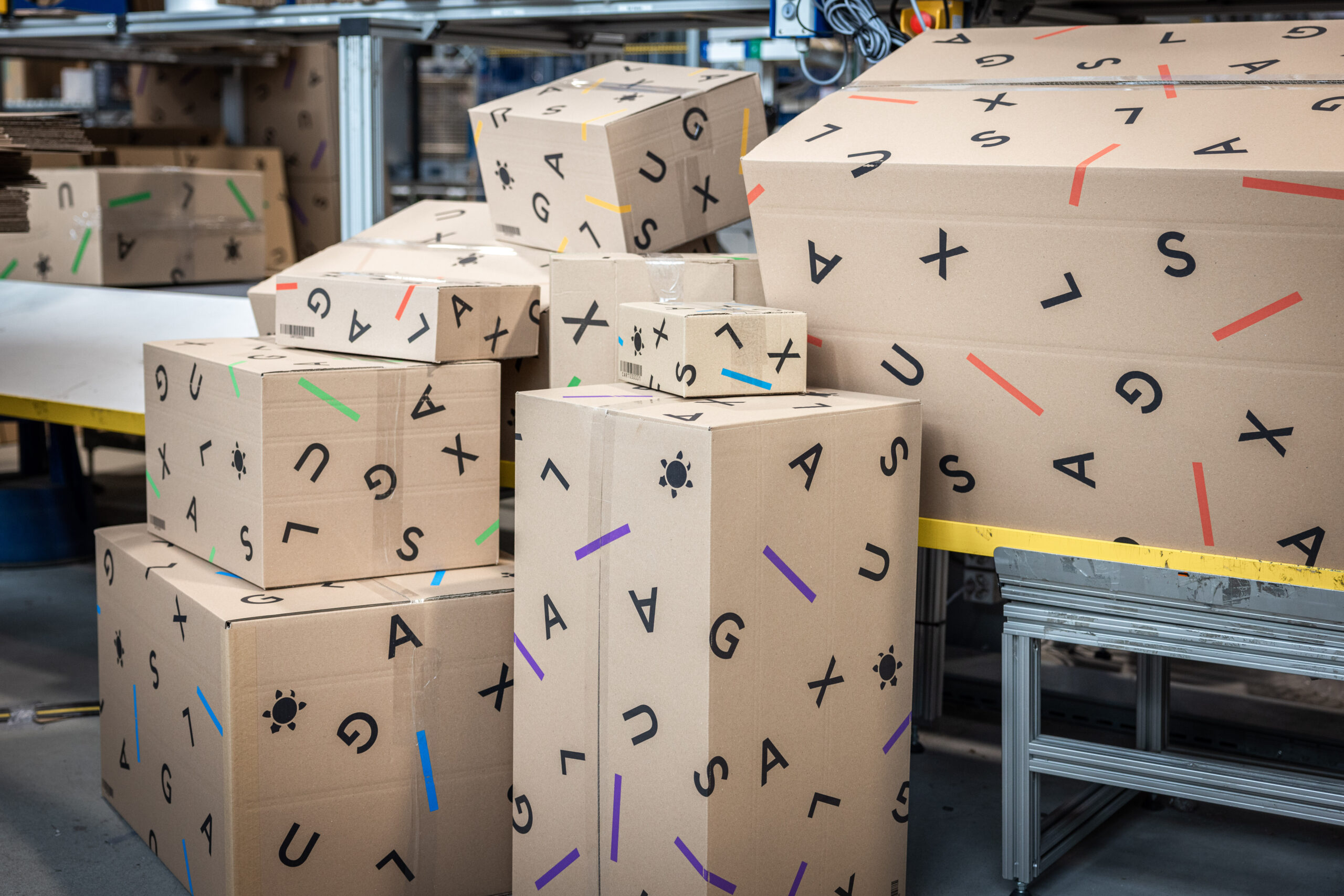 Stacked shipping parcels prepared for outbound dispatch