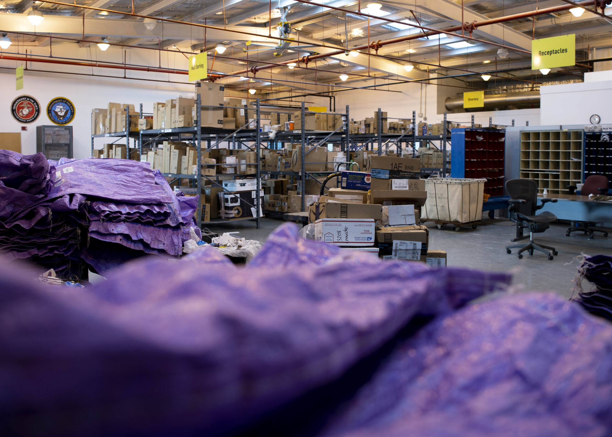 Parcels moving through a sorting area before delivery