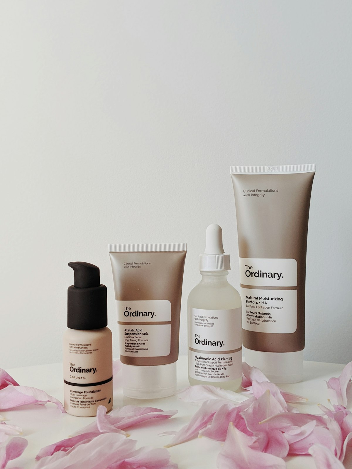 Skincare products and packaging materials staged before parcel consolidation