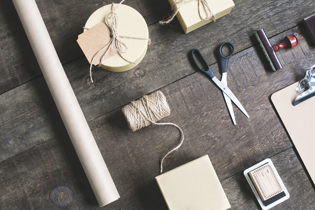 Shipping packaging materials flatlay with boxes and envelopes