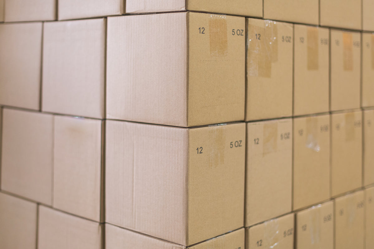 Stacked shipping boxes ready for parcel consolidation