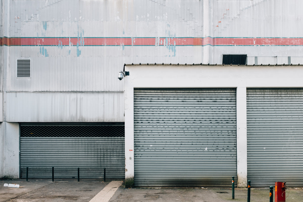 Exterior of a modern warehouse facility representing Chinese e-commerce logistics