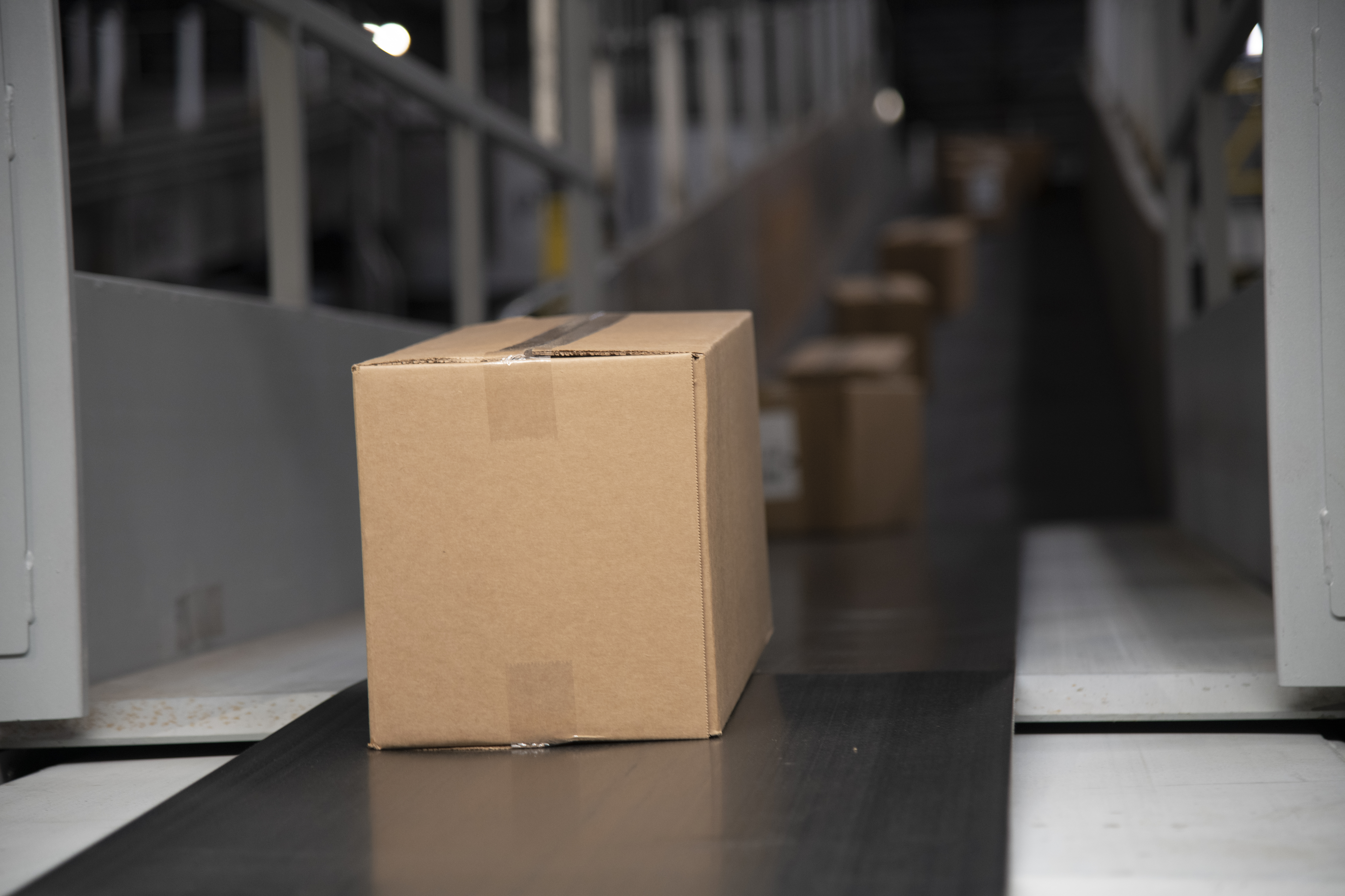 Packages moving on a conveyor belt