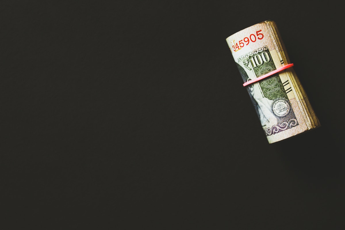 Australian dollar banknotes alongside imported parcels