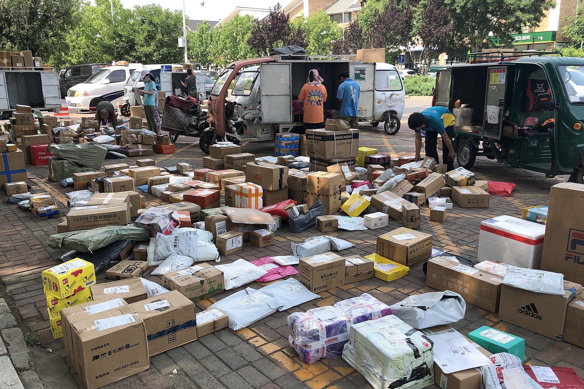 Many parcels awaiting collection on a street in Beijing