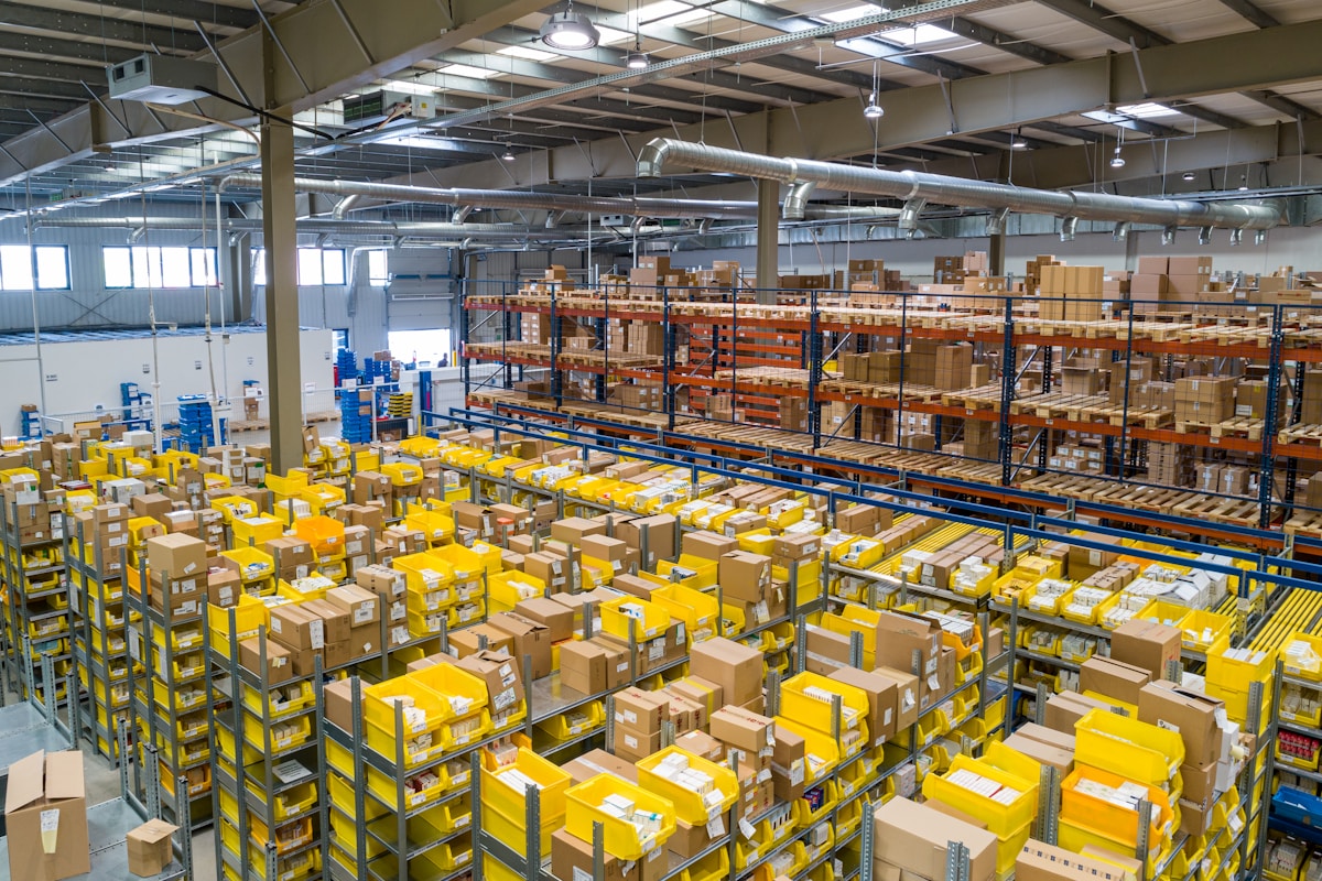Warehouse staff scanning consolidated packages for international dispatch